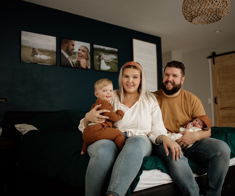 Mother and father with infant and toddler